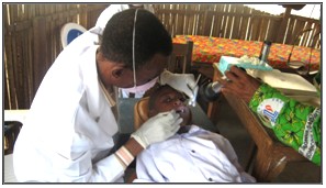 dentist and patient at PAX clinic in Kananga
